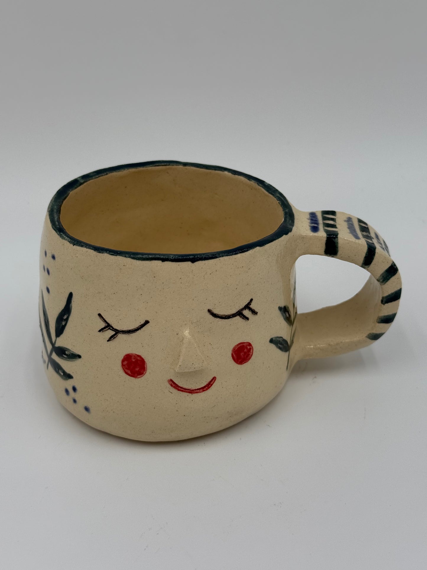 TAZA RÚSTICA DE CERÁMICA CON CARITA
