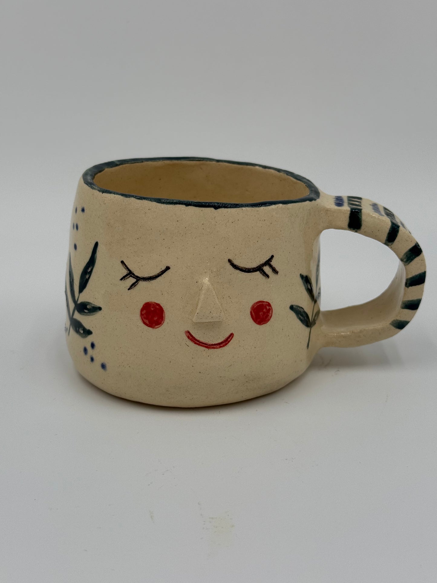 TAZA RÚSTICA DE CERÁMICA CON CARITA